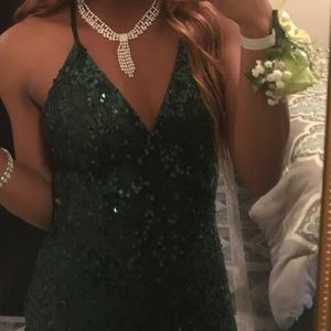 Emerald green prom dress with short train